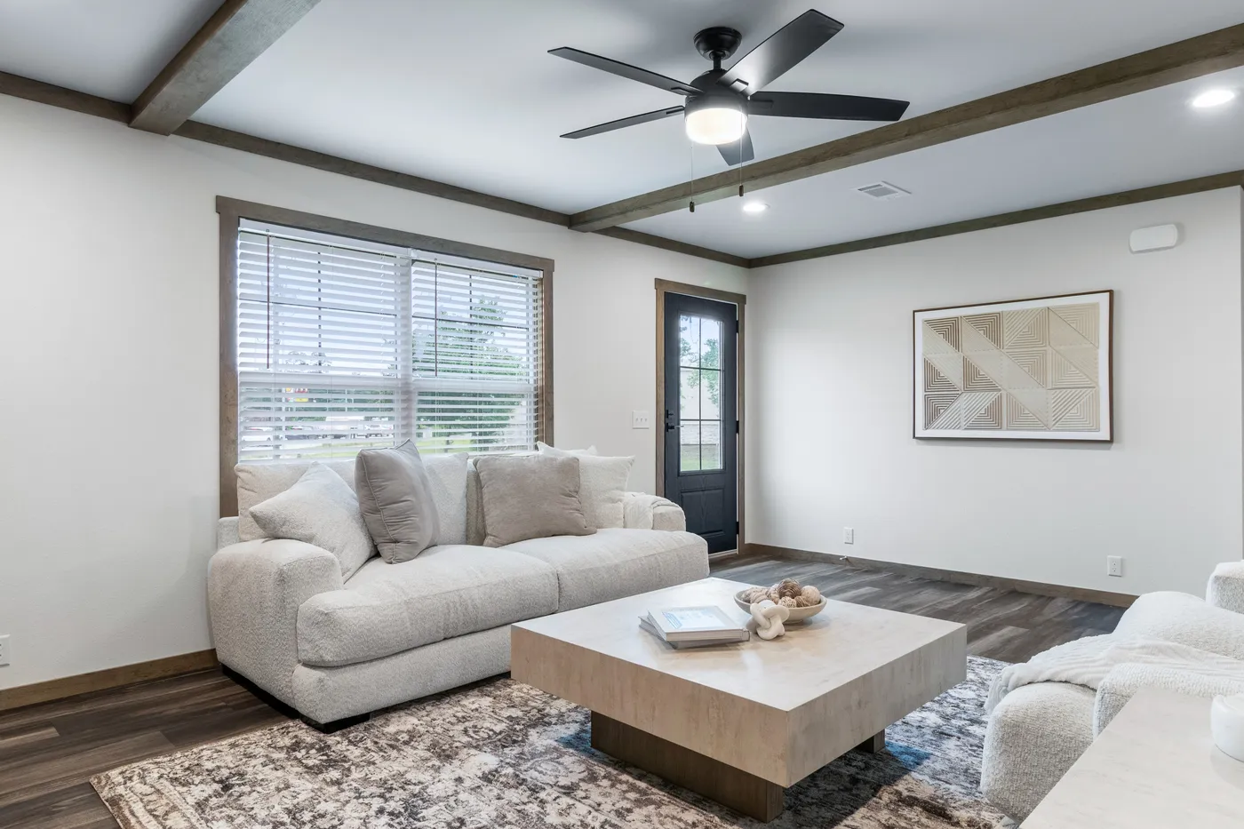 The EVERETT ELITE Living Room. This Manufactured Mobile Home features 4 bedrooms and 3 baths.