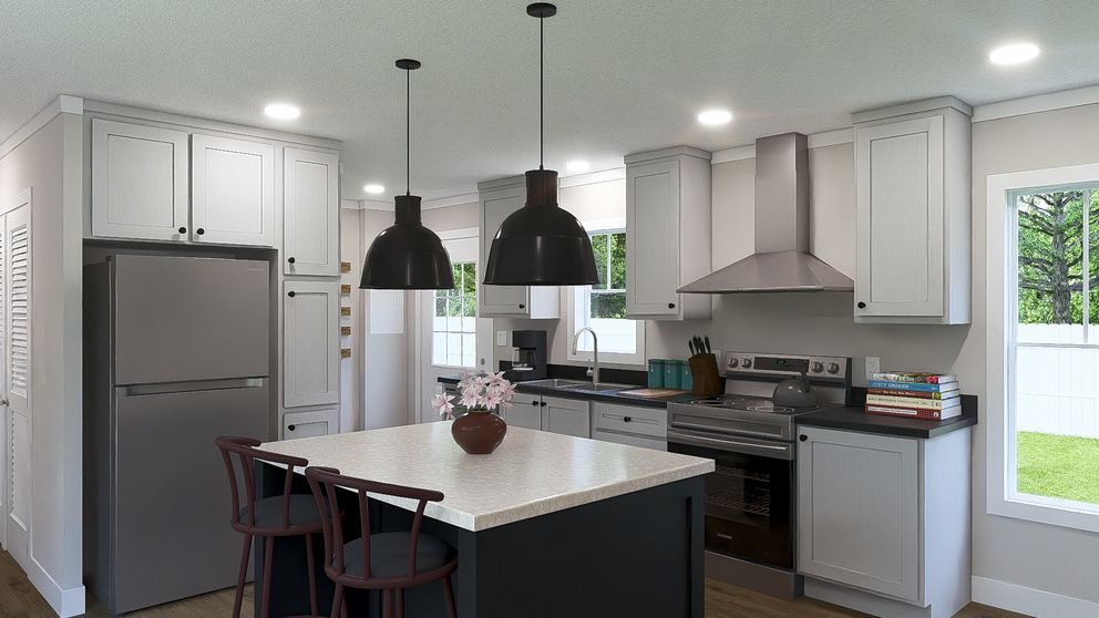 The STILL THE ONE Kitchen. This Manufactured Mobile Home features 2 bedrooms and 2 baths.