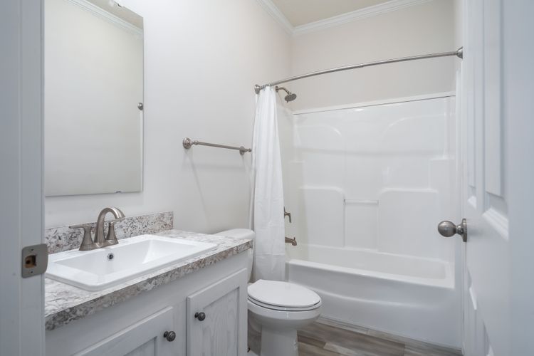 The 3542 MOD 56X28 CAVALIER SELECT Guest Bathroom. This Modular Home features 3 bedrooms and 2 baths.
