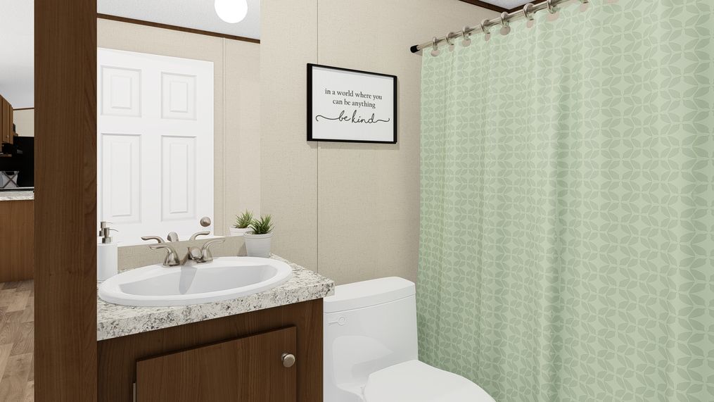 The DELIGHT Guest Bathroom. This Manufactured Mobile Home features 2 bedrooms and 2 baths.