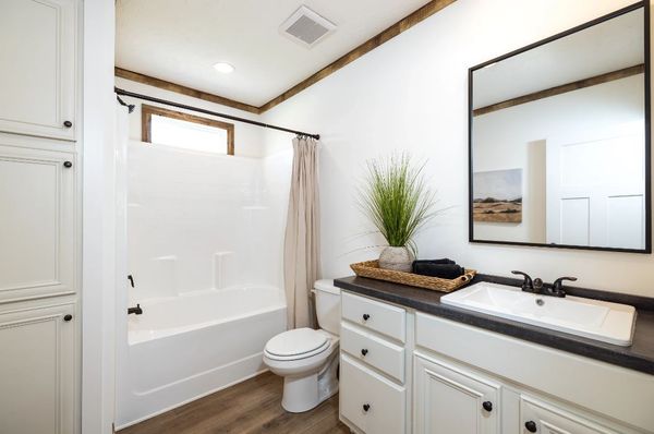 The ARABELLA Guest Bathroom. This Manufactured Mobile Home features 3 bedrooms and 2 baths.