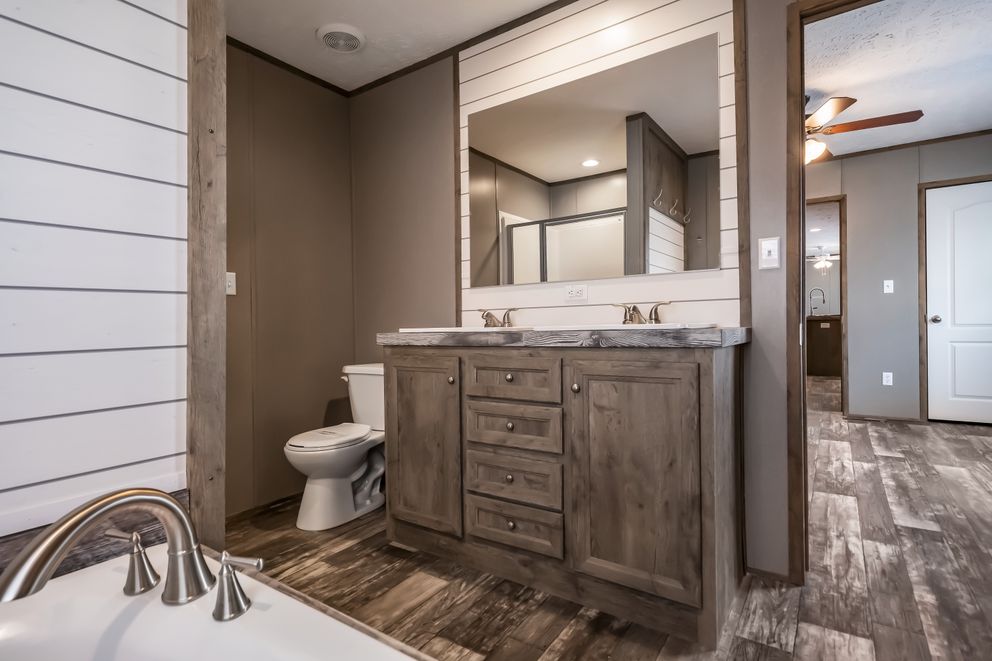 The PEYTON Exterior. This Manufactured Mobile Home features 3 bedrooms and 2 baths.