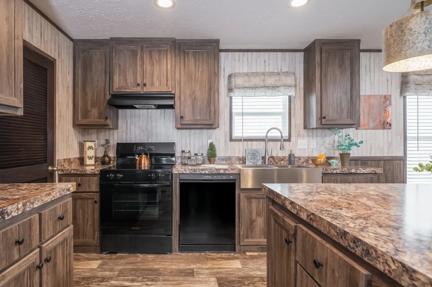 The HARDIN Kitchen. This Manufactured Mobile Home features 3 bedrooms and 2 baths.