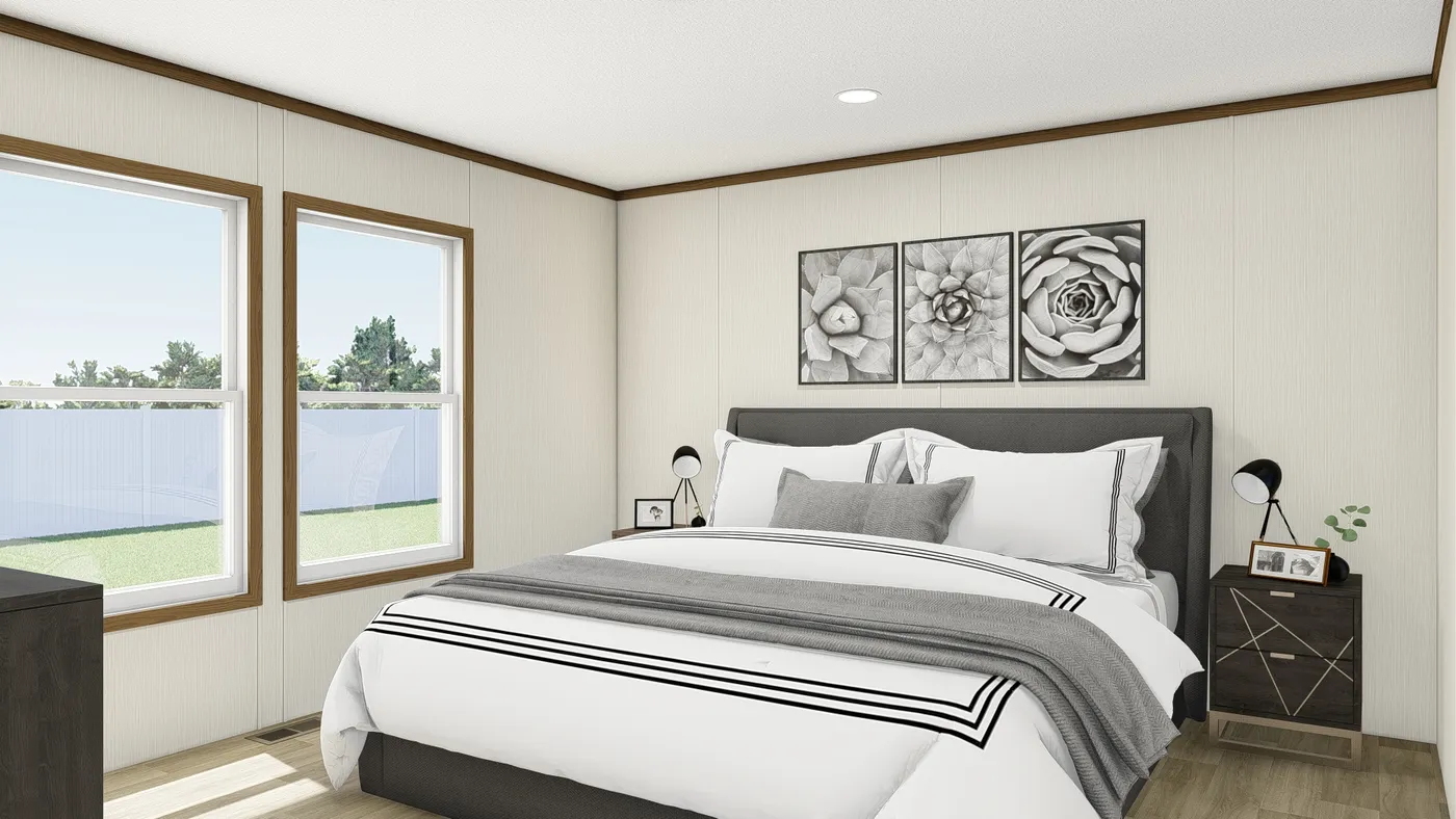The IMPACT Primary Bedroom. This Manufactured Mobile Home features 4 bedrooms and 2 baths.