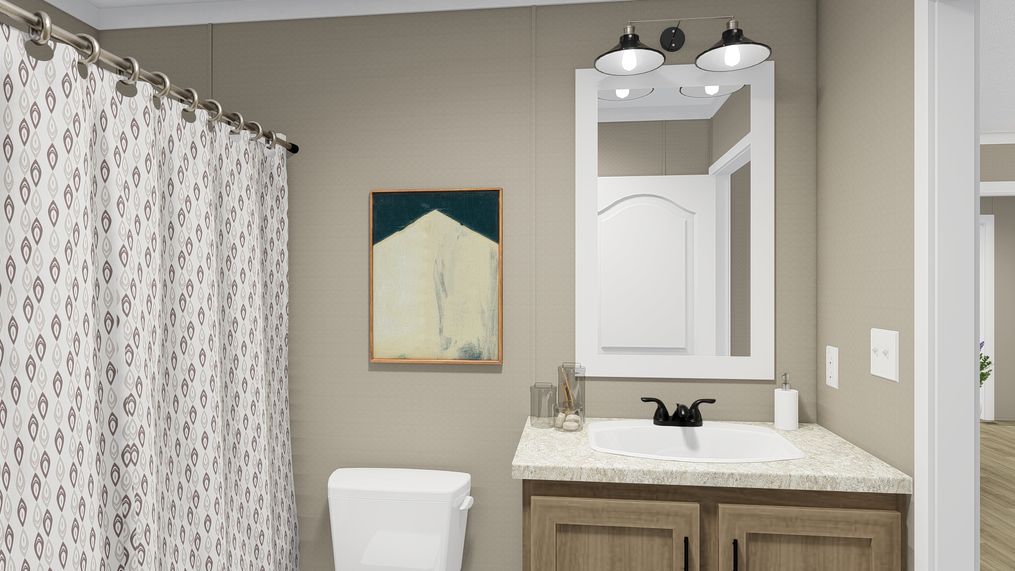 The THE FUSION 68 Guest Bathroom. This Manufactured Mobile Home features 3 bedrooms and 2 baths.