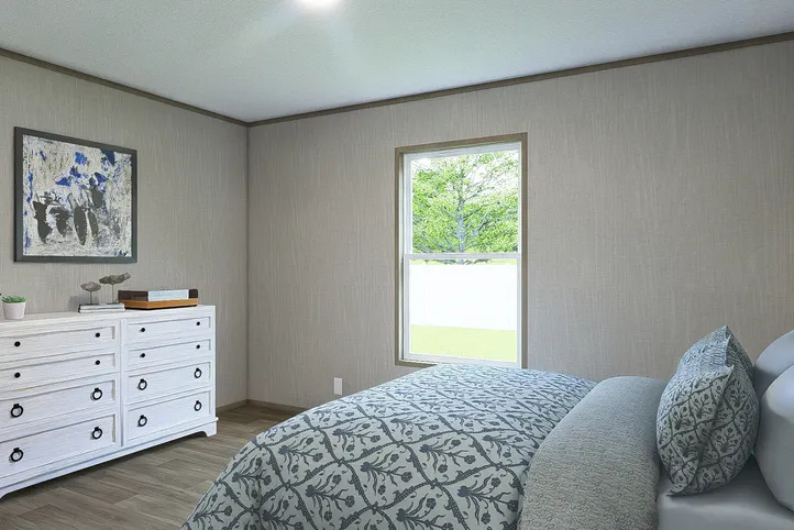 The EVEREST Guest Bedroom. This Manufactured Mobile Home features 4 bedrooms and 2 baths.