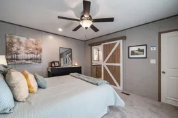 The WARRIOR Primary Bedroom. This Home features 2 bedrooms and 2 baths.