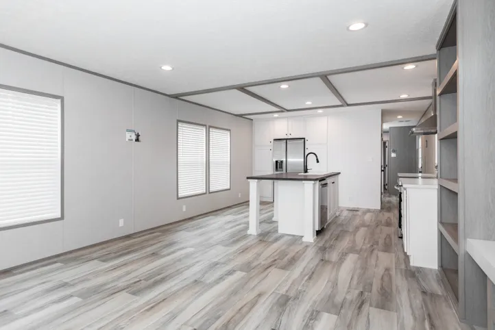 The PLATINUM ANNIVERSARY Living Room. This Manufactured Mobile Home features 3 bedrooms and 2 baths.