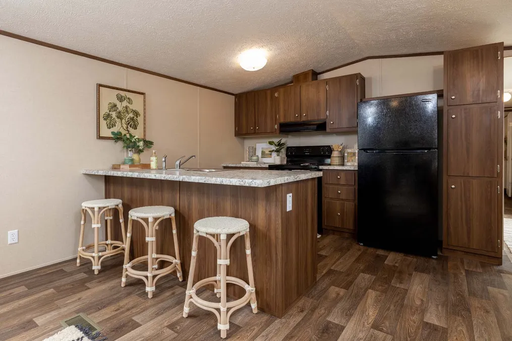 The CELEBRATION Kitchen. This Manufactured Mobile Home features 3 bedrooms and 2 baths.