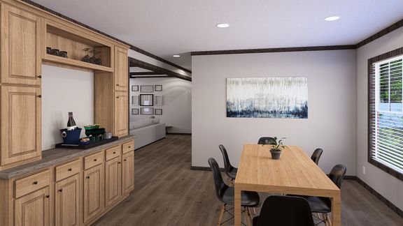 The THE JACKSON Dining Area. This Manufactured Mobile Home features 4 bedrooms and 2 baths.