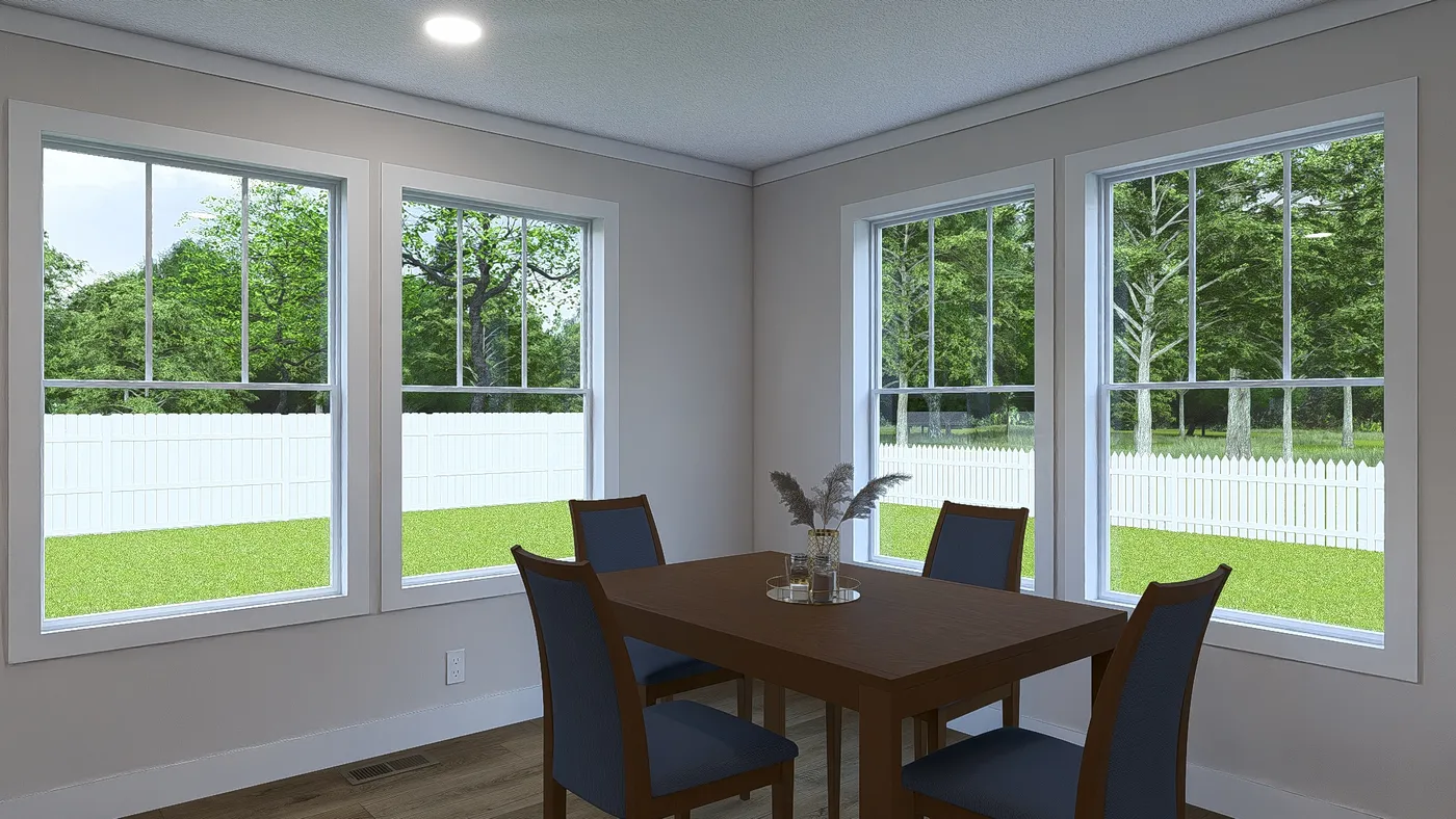 The WHOLE LOTTA LOVE Dining Area. This Manufactured Mobile Home features 3 bedrooms and 2 baths.