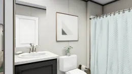 The LEGEND 28X56 3 BR Guest Bathroom. This Manufactured Mobile Home features 3 bedrooms and 2 baths.