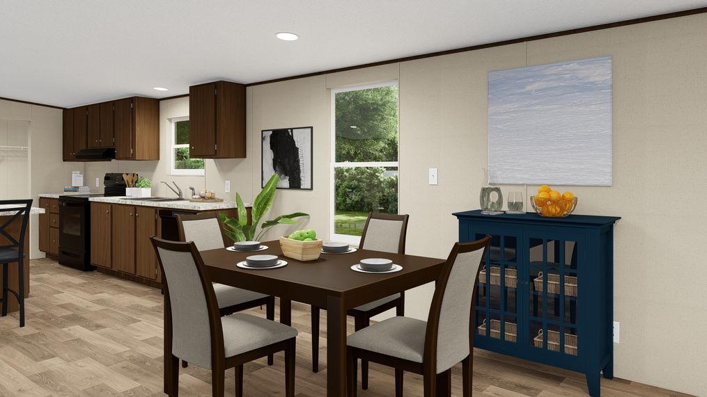 The WONDER Dining Area. This Manufactured Mobile Home features 4 bedrooms and 2 baths.
