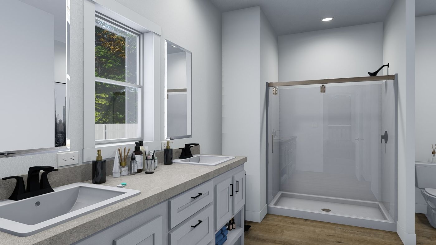 The GRAND Primary Bathroom. This Manufactured Mobile Home features 4 bedrooms and 3 baths.