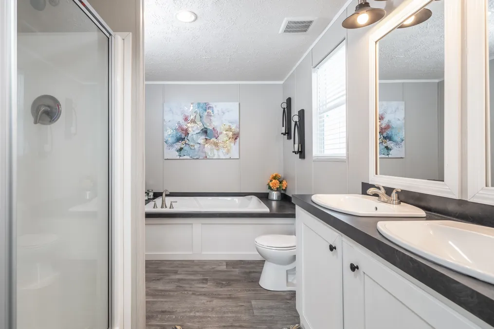 The TRADITION 48 Primary Bathroom. This Manufactured Mobile Home features 3 bedrooms and 2 baths.