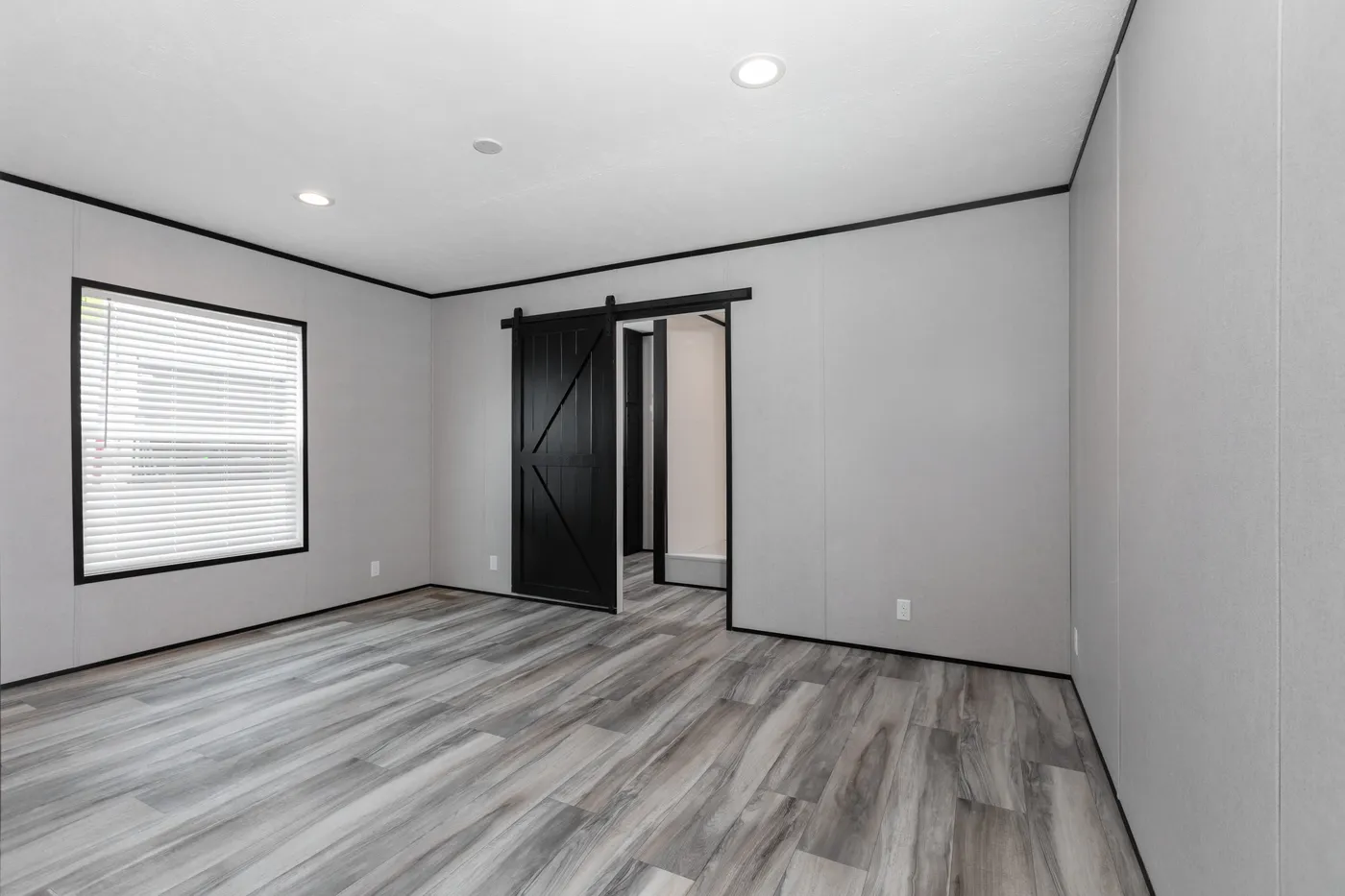 The THE SMOKEY Bedroom. This Manufactured Mobile Home features 3 bedrooms and 2 baths.