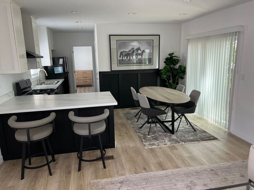 The SUNRISE 68 Kitchen. This Manufactured Mobile Home features 2 bedrooms and 2 baths.