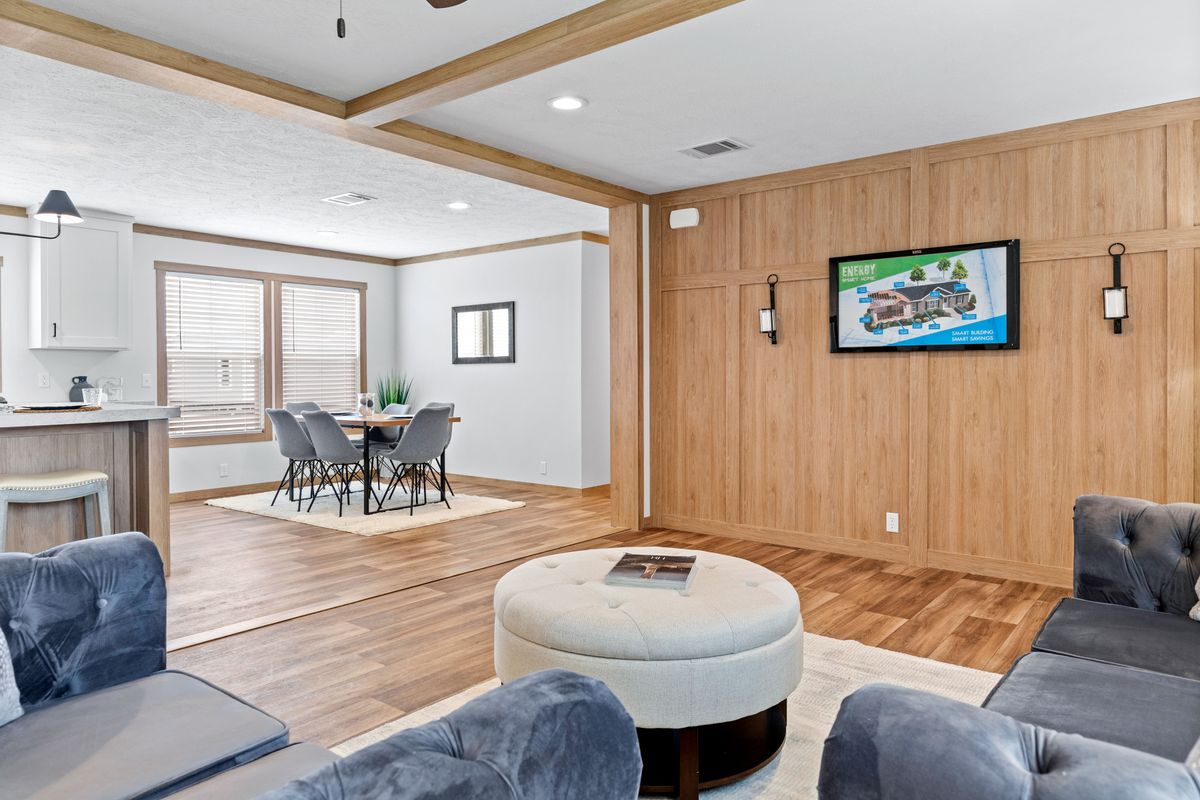 The HARPER Living Room. This Manufactured Mobile Home features 3 bedrooms and 2 baths.