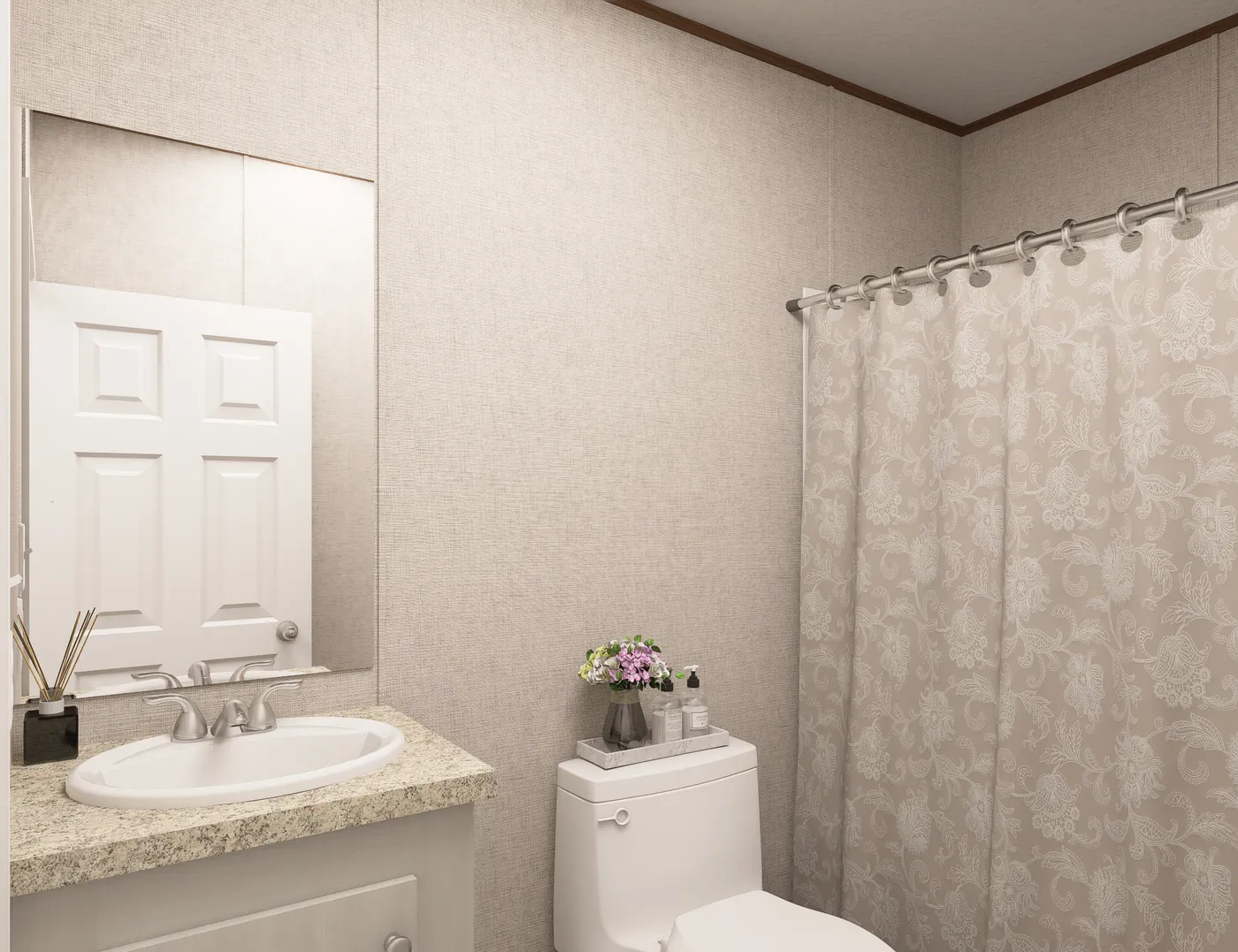 The SPRUCE Guest Bathroom. This Manufactured Mobile Home features 3 bedrooms and 2 baths.