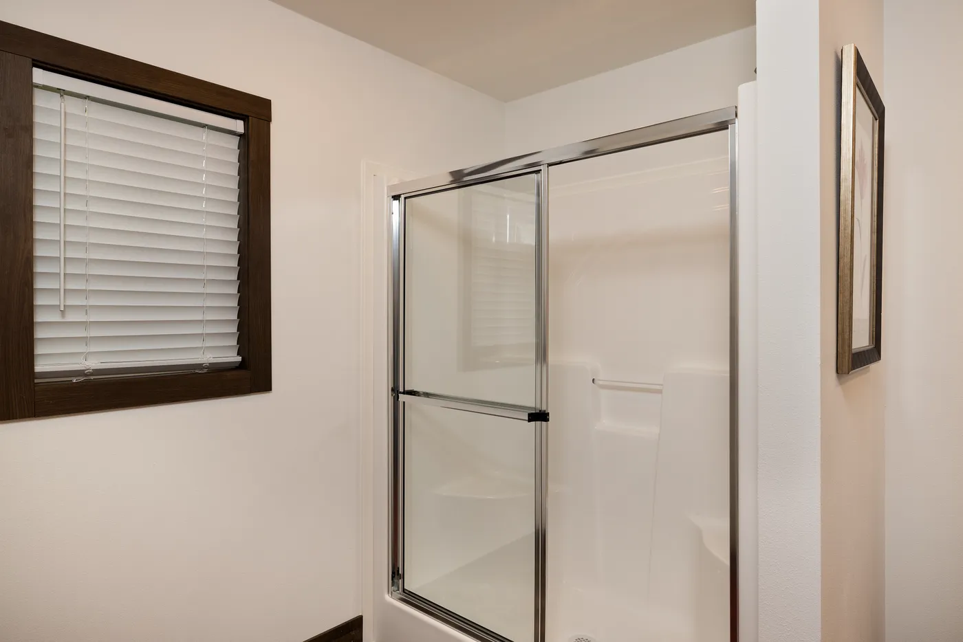 The RAMSEY 75 Primary Bathroom. This Manufactured Mobile Home features 4 bedrooms and 2 baths.