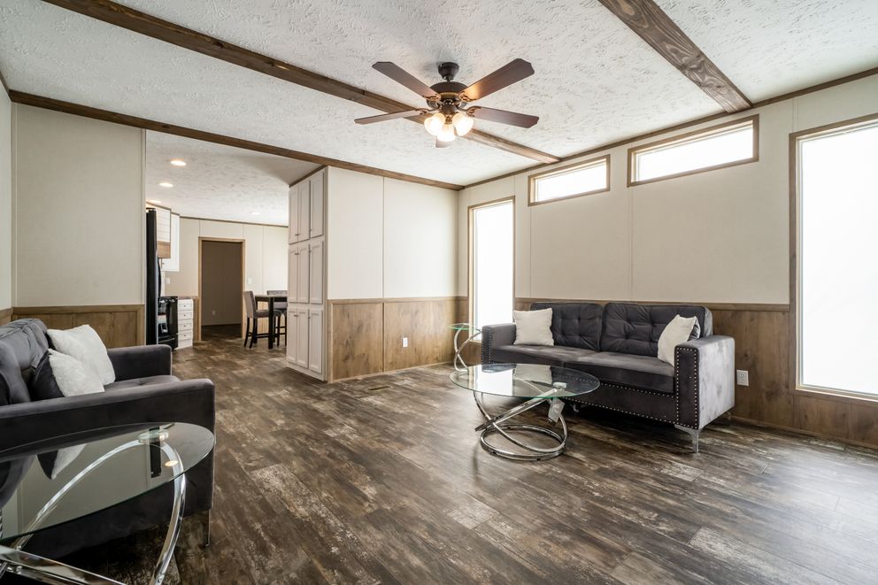 The ANNIVERSARY ENTERTAINER Exterior. This Manufactured Mobile Home features 3 bedrooms and 2 baths.