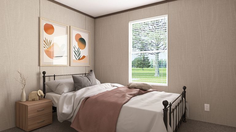 The THE RESERVE 60 Bedroom. This Manufactured Mobile Home features 3 bedrooms and 2 baths.