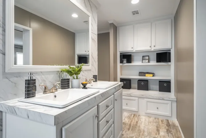 The CASCADE Primary Bathroom. This Manufactured Mobile Home features 4 bedrooms and 2 baths.