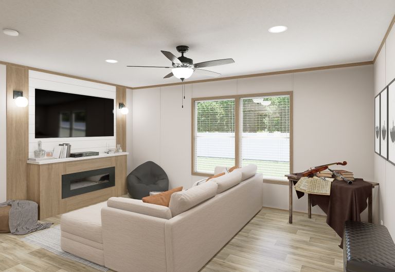 The THE MOUNTAINEER 72 Living Room. This Manufactured Mobile Home features 3 bedrooms and 2 baths.