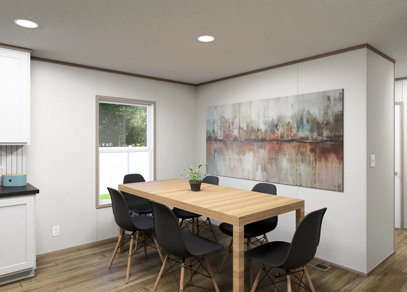 The ASPIRE Dining Area. This Manufactured Mobile Home features 3 bedrooms and 2 baths.
