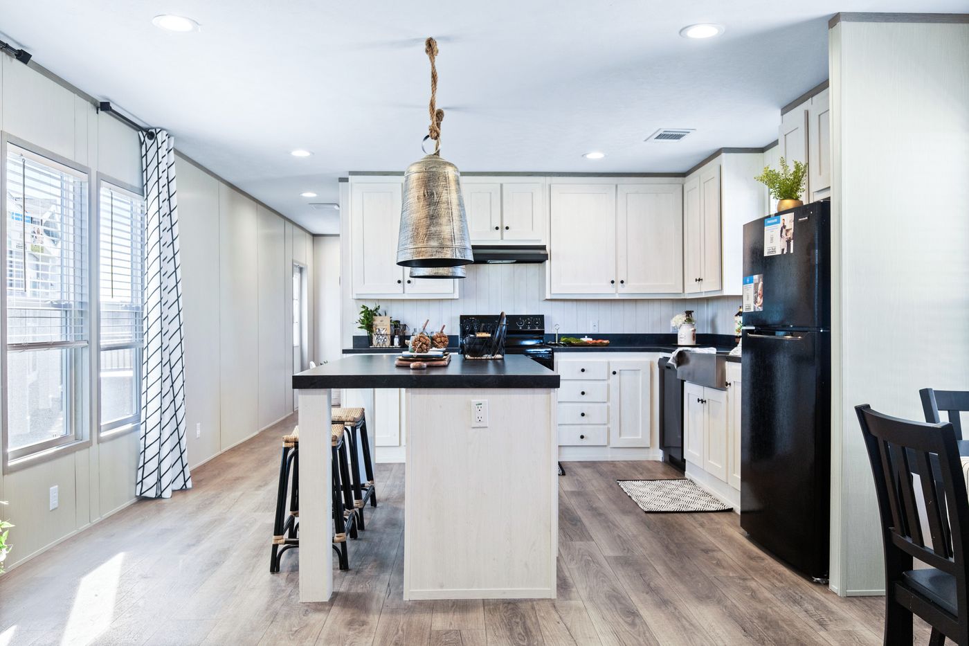 The PORCH LIVING SERIES 16682A Kitchen. This Manufactured Mobile Home features 2 bedrooms and 2 baths.