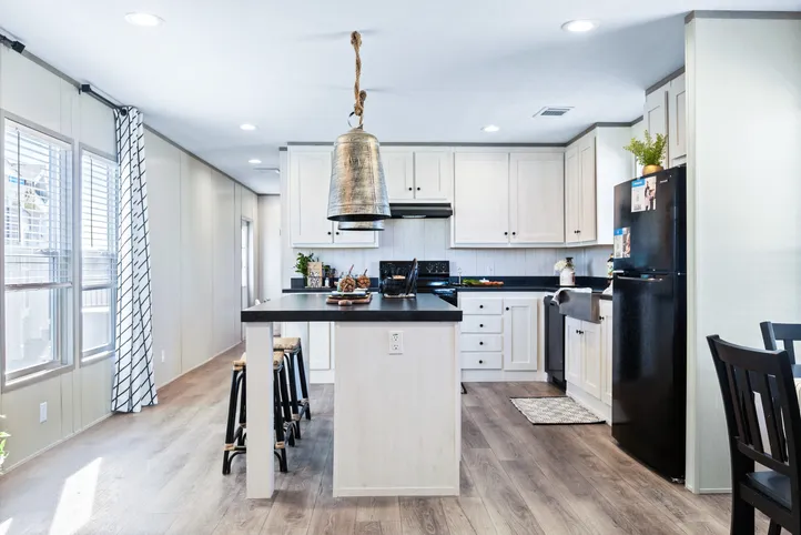 The PORCH LIVING SERIES 16682A Kitchen. This Manufactured Mobile Home features 2 bedrooms and 2 baths.