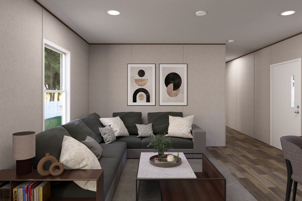 The ASPEN Living Room. This Manufactured Mobile Home features 3 bedrooms and 2 baths.