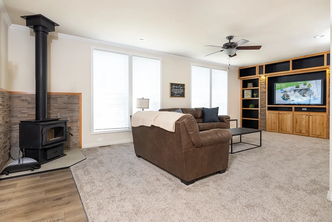 The TH601F                 CLAYTON Living Room. This Manufactured Mobile Home features 3 bedrooms and 2 baths.