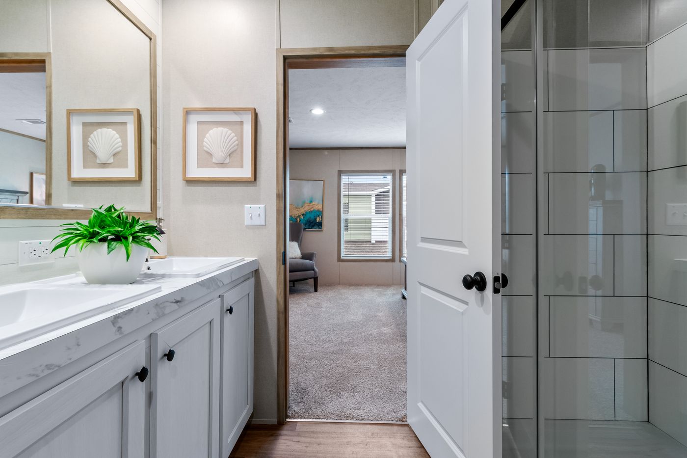 The THE CHOICE Primary Bathroom. This Manufactured Mobile Home features 4 bedrooms and 2 baths.