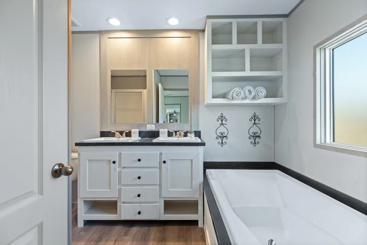 The RESOLUTION 16763J Primary Bathroom. This Manufactured Mobile Home features 3 bedrooms and 2 baths.
