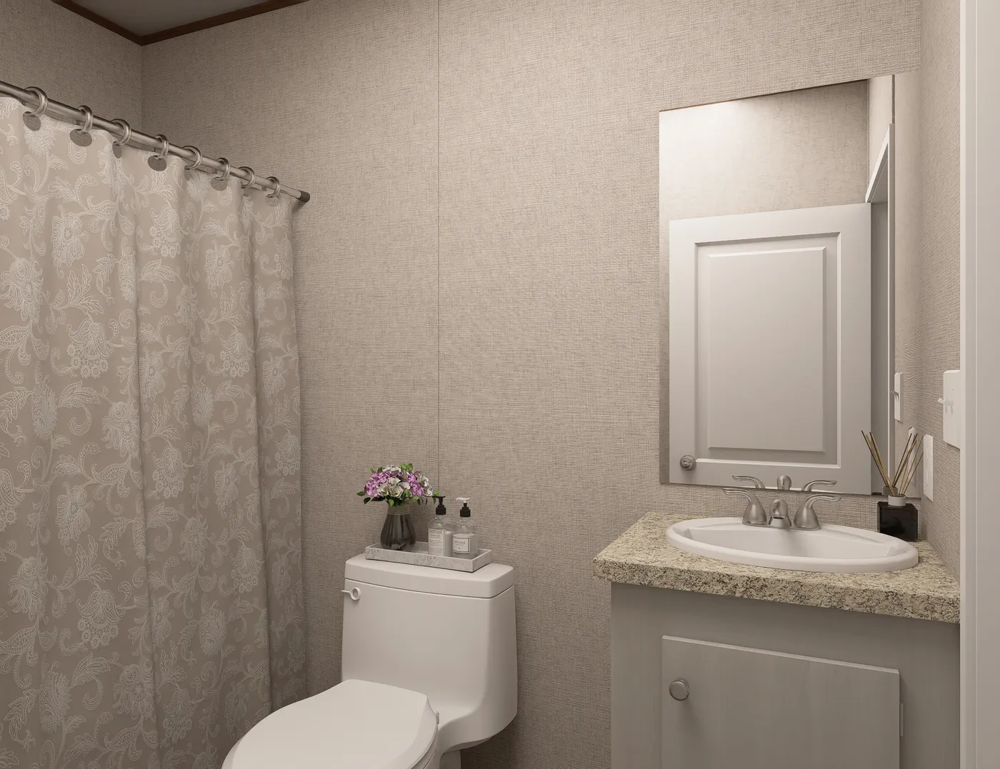 The REDWOOD Guest Bathroom. This Manufactured Mobile Home features 5 bedrooms and 3 baths.