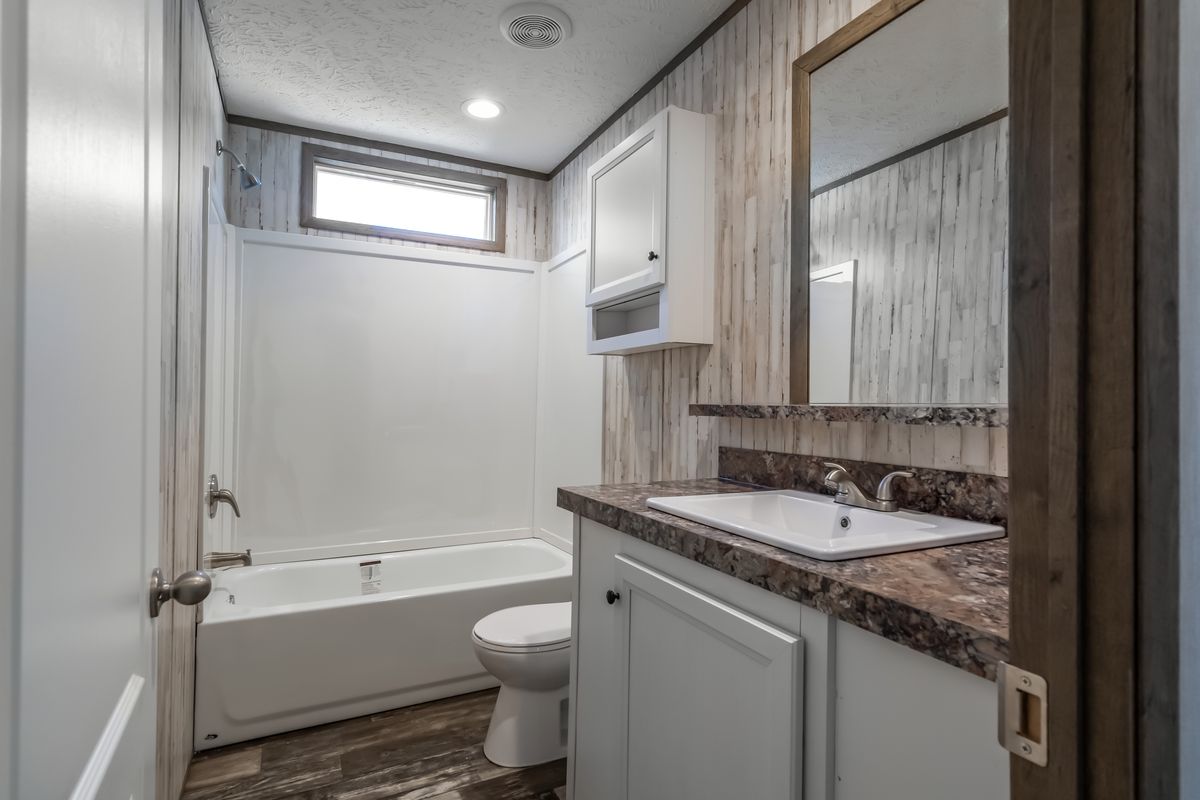 The NUMBER ONE Exterior. This Manufactured Mobile Home features 3 bedrooms and 2 baths.