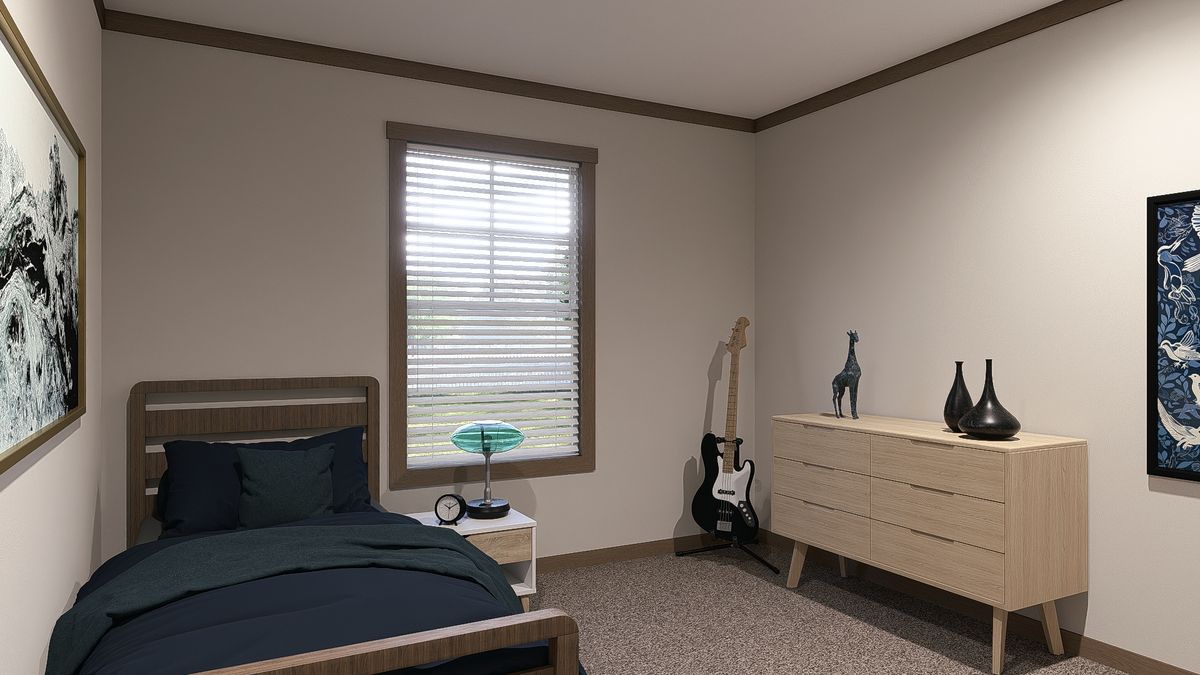 The EMILIE ELITE Guest Bedroom. This Manufactured Mobile Home features 3 bedrooms and 2 baths.