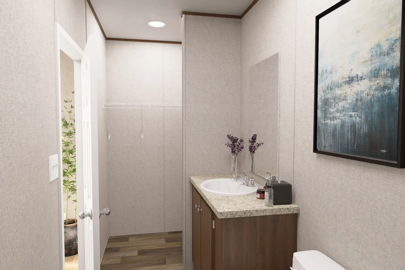 The MAGNOLIA Primary Bathroom. This Manufactured Mobile Home features 3 bedrooms and 2 baths.
