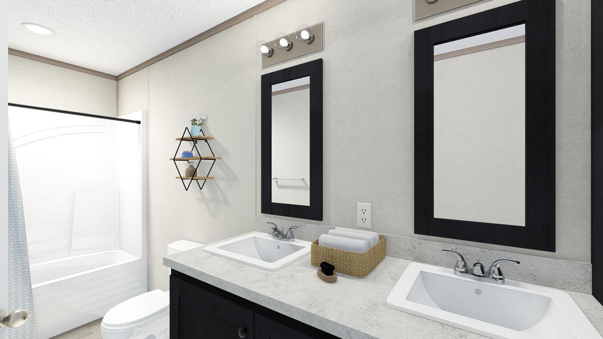 The 7616-4779 THE PULSE Primary Bathroom. This Manufactured Mobile Home features 3 bedrooms and 2 baths.