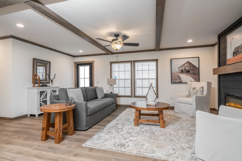 The THE LIZZIE Living Room. This Manufactured Mobile Home features 3 bedrooms and 2 baths.
