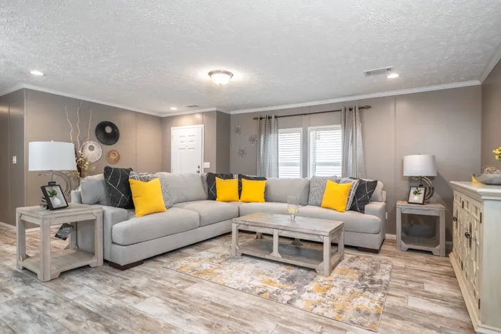 The CASCADE Living Room. This Manufactured Mobile Home features 4 bedrooms and 2 baths.