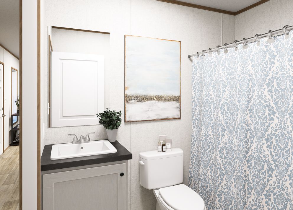 The BEACON Exterior. This Manufactured Mobile Home features 3 bedrooms and 2 baths.
