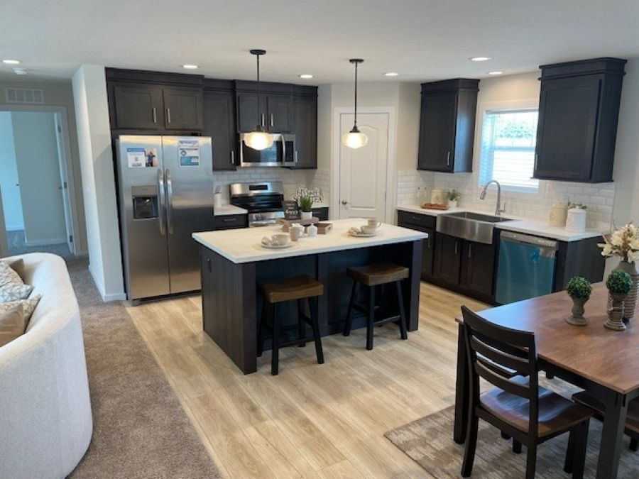 The SOMERSET DR/5228-MS012-1 SECT Kitchen. This Manufactured Mobile Home features 3 bedrooms and 2 baths.