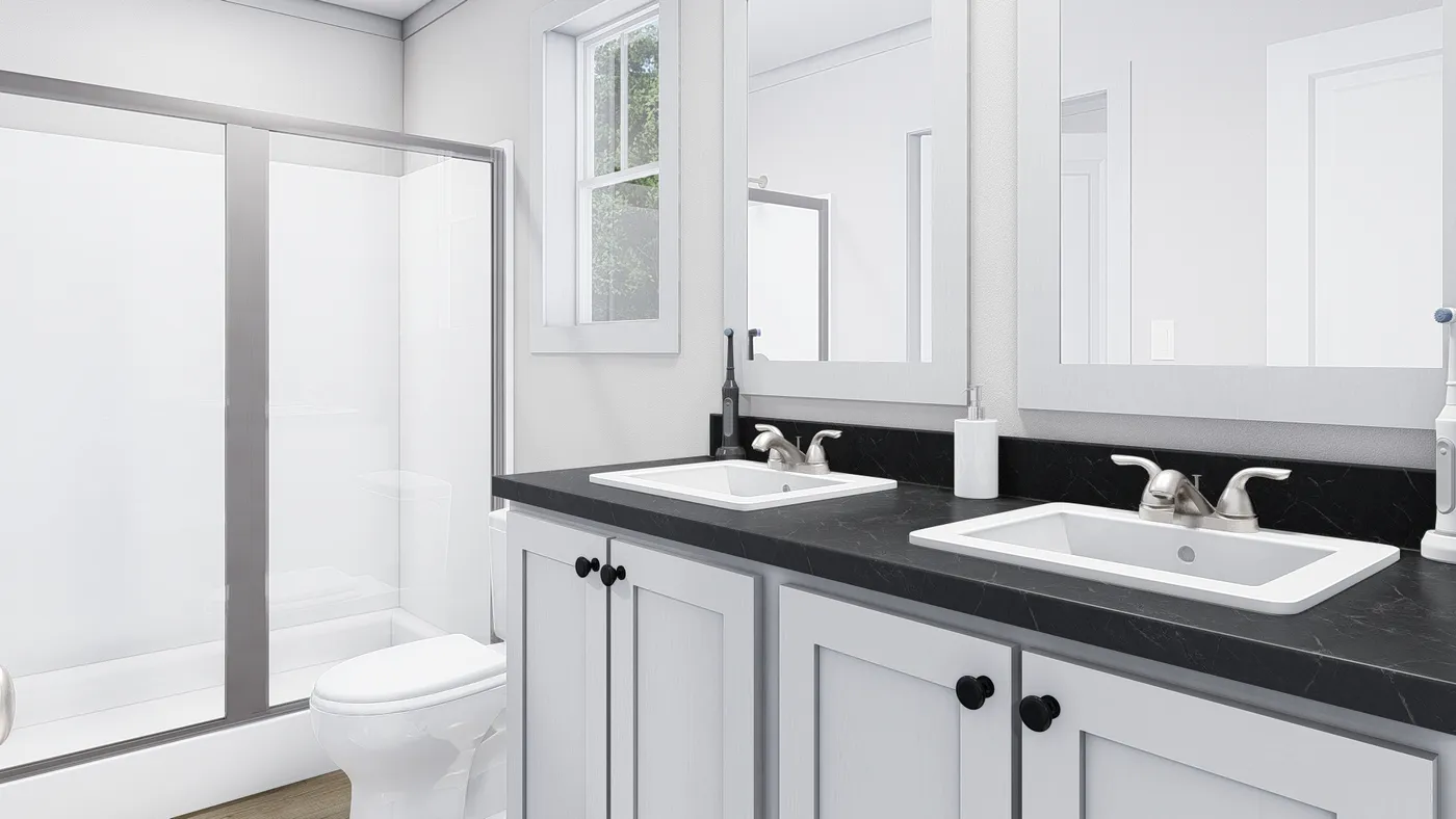 The RISING SUN Primary Bathroom. This Manufactured Mobile Home features 2 bedrooms and 2 baths.