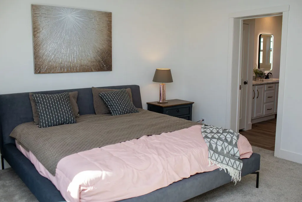 The ENCORE Primary Bedroom. This Manufactured Mobile Home features 3 bedrooms and 2 baths.