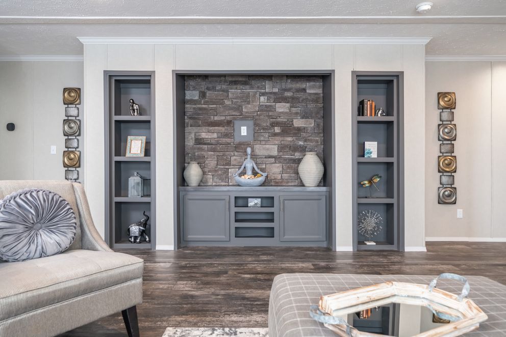 The ALL AMERICAN Living Room. This Manufactured Mobile Home features 3 bedrooms and 2 baths.