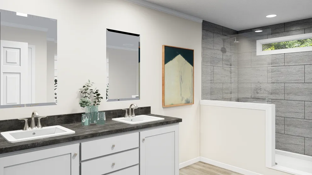 The PALMETTO 6101 Primary Bathroom. This Manufactured Mobile Home features 4 bedrooms and 2.5 baths.