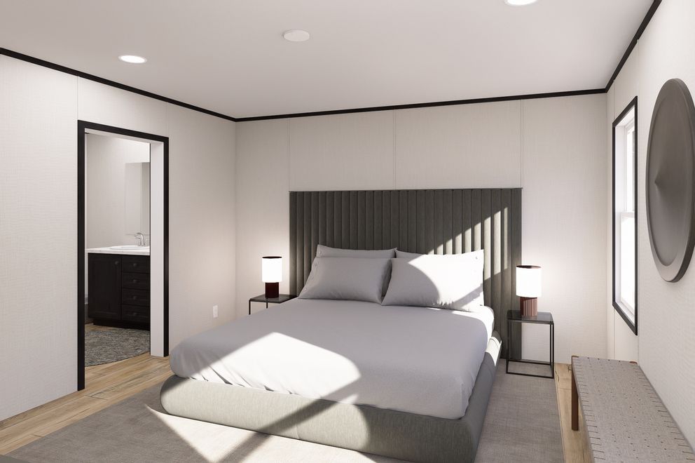 The ULTRA FLEX Primary Bedroom. This Manufactured Mobile Home features 3 bedrooms and 2 baths.