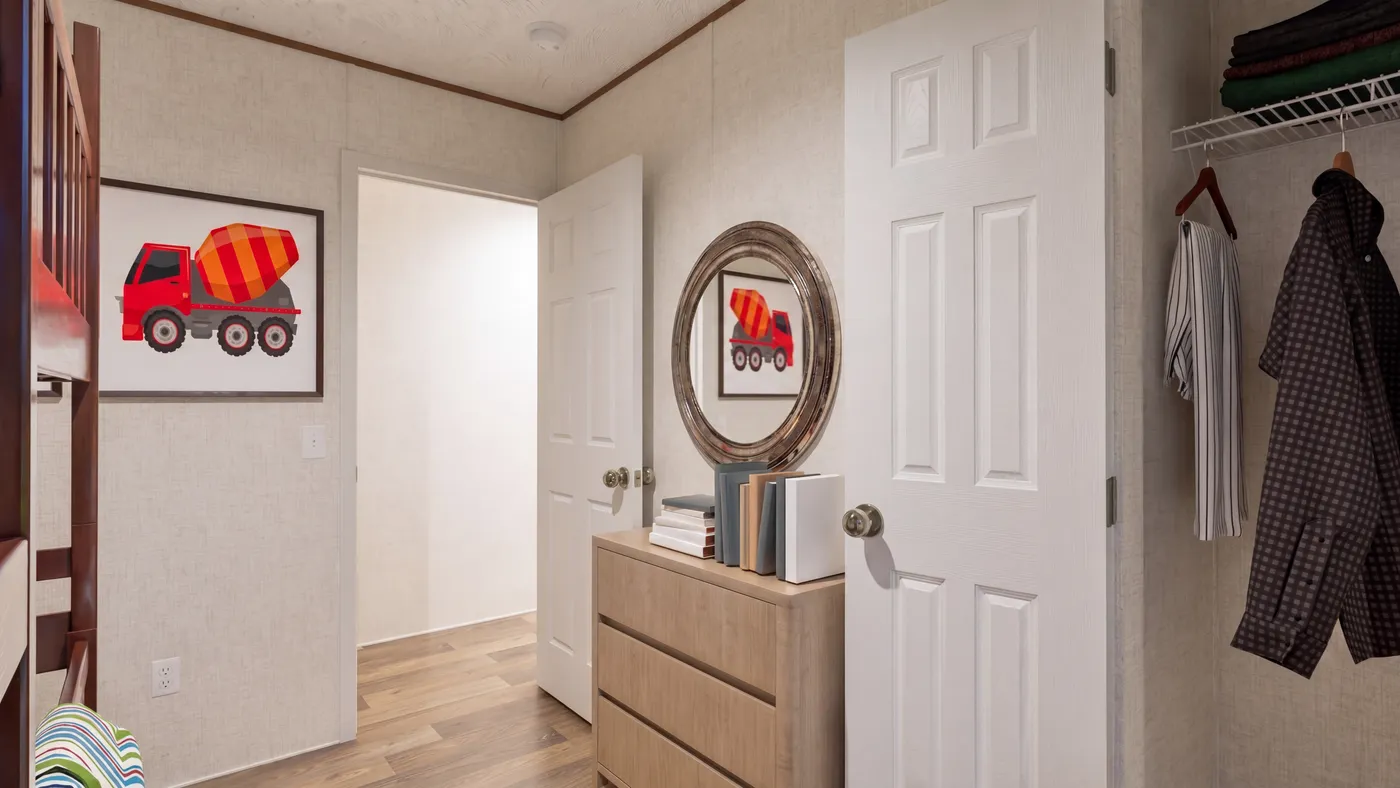 The CYPRESS Guest Bedroom. This Manufactured Mobile Home features 4 bedrooms and 2 baths.
